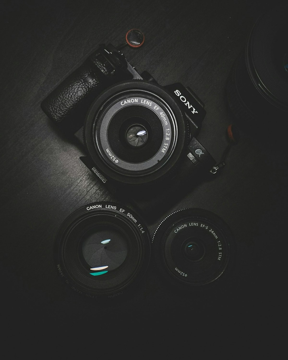 Camera and lenses on black